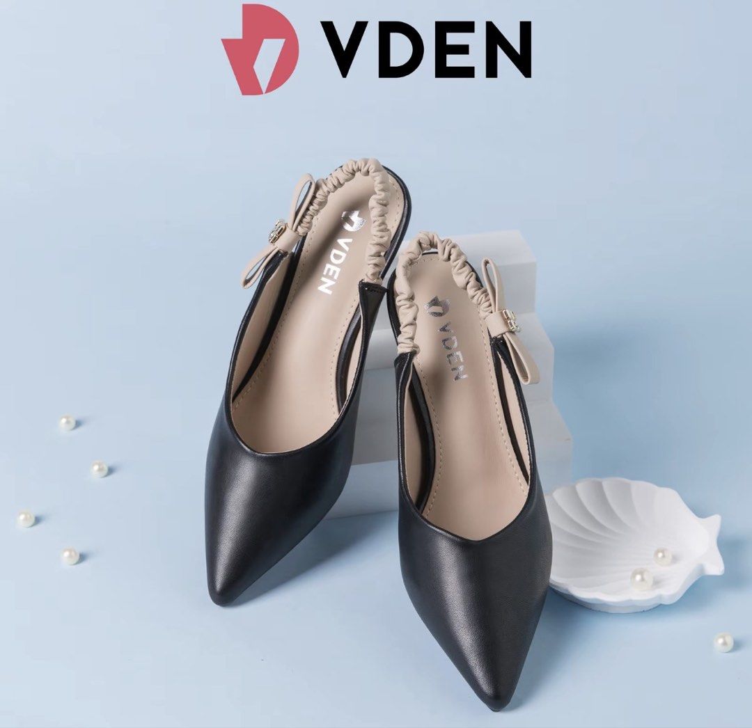 Vden Black Slingback Heels with Bow Detail (Category: Heels) located in Manila. Submitted by imda1 (Listing ID 1457762913, Image 2). Description: - Brand: Vden - Style: Black slingback heels - Design: Pointed toe - Features: Elasticated back strap with a small bow detail, clear heel accent -no box Size: 38 (best fit 23.5cm shoe size).