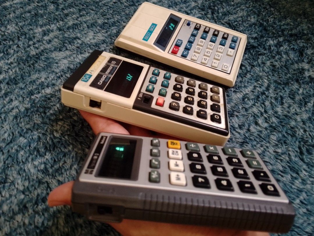 Vintage Electronic Calculators Casio National Best Bios (Category: Office & Business Technology) located in Binangonan. Submitted by stufflikedat (Listing ID 1457812618, Image 2). Description: -Vintage Casio Memory-10 electronic calculator, released in the 1970s and featuring a green vacuum fluorescent display (VFD) tube.It is a 10-digit handheld electronic calculator with dedicated memory keys (MR, M-, M+).It includes an operational mode switch 
