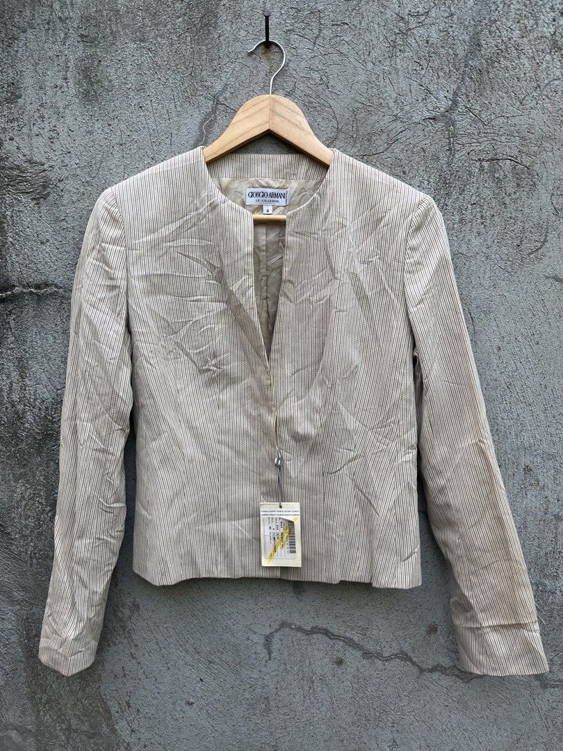 Vintage Giorgio Armani (Category: Luxury Apparel) located in Davao. Submitted by streetsight (Listing ID 1457743247, Image 1). Description: Giorgio Armani Le Collezioni beige pinstripe collarless jacket with a single front closure detail. Brand-new Condition Need wash Width 18 Length 22 Sleeve 24.