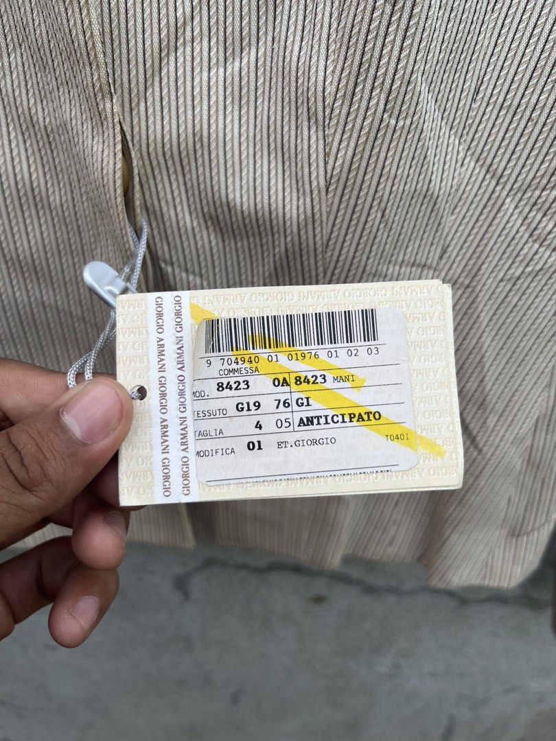Vintage Giorgio Armani (Category: Luxury Apparel) located in Davao. Submitted by streetsight (Listing ID 1457743247, Image 3). Description: Giorgio Armani Le Collezioni beige pinstripe collarless jacket with a single front closure detail. Brand-new Condition Need wash Width 18 Length 22 Sleeve 24.
