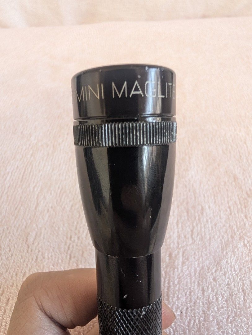 Vintage Mini Maglite Flashlight Torch (Category: Lighting) located in Marikina City. Submitted by mrtncdrc (Listing ID 1457751505, Image 3). Description: Item is working as shown on the photos. Powered by 2 AA batteries and a pair will be included upon purchase..