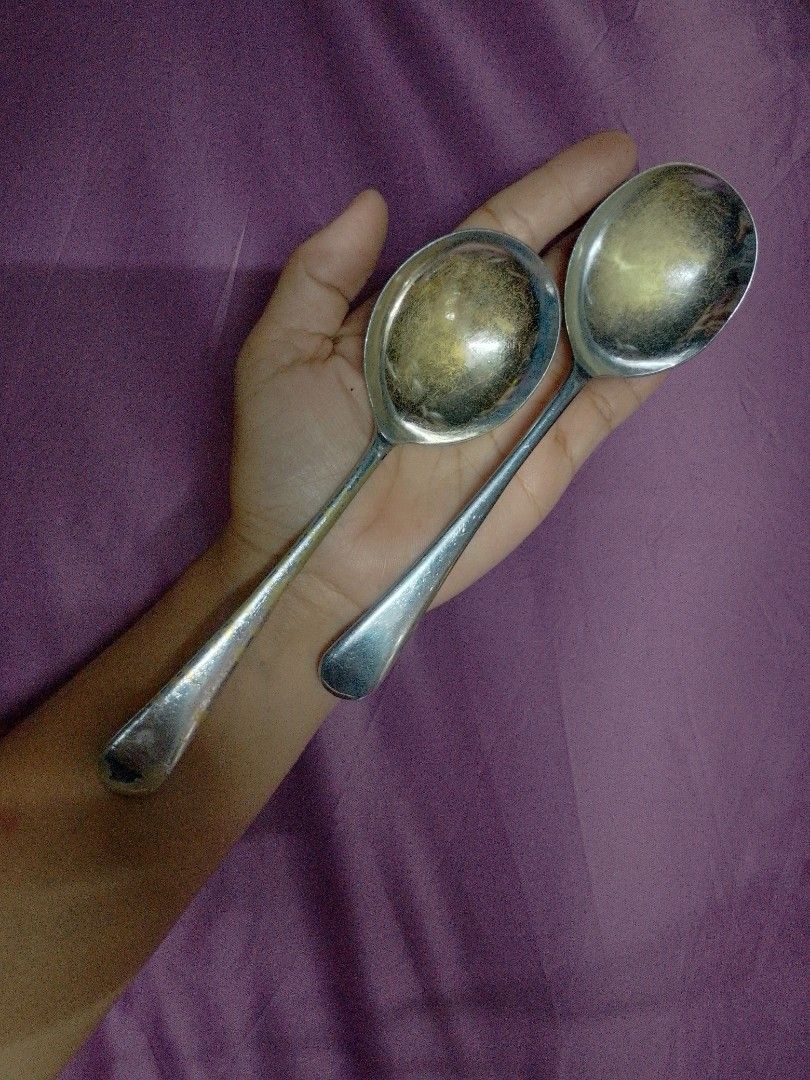 Vintage Silver Plated Serving Spoons - Sheffield England (Category: Dinnerware & Cutlery) located in Cardona. Submitted by nick_and_maria (Listing ID 1457864128, Image 1). Description: - Set of 2 vintage serving spoons - Silver plated - Made in Sheffield, England - Shows some tarnishing and wear on handles and bowls - Good weight and shine when polished - Ideal for serving food or as a decorative accent.
