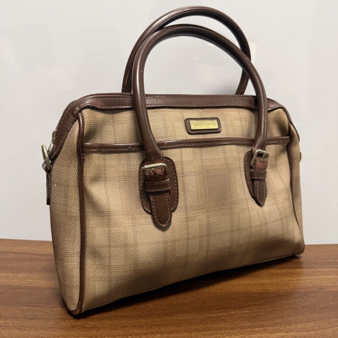 Vintage Tan Plaid Satchel Bag (Category: Shoulder Bags) located in Baliuag. Submitted by from.linea (Listing ID 1457786437, Image 3). Description: Vintage Tan Plaid Satchel Bag Price: ₱1,300 Brand: Liz Claiborne RFS: Decluttering (personal preloved bags, not bought from ukay) Location: Baliuag, Bulacan Pickup/Meet-up: Around Baliuag Delivery Options: SPX | Lalamove (Delivery fee will be shouldered by the buyer) Additional Notes: Feel free to send