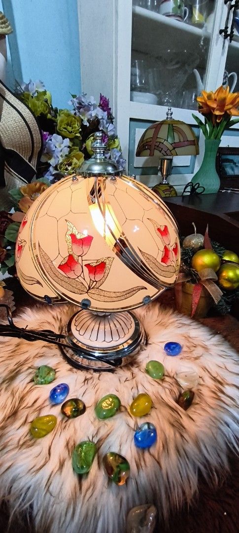 VINTAGE TIFFANY STYLE LAMPSHADE (Category: Lighting) located in Manila. Submitted by shawn0320_fish (Listing ID 1457862107, Image 2). Description: Mga ka-shoppee! ✨ Up for grabs is this gorgeous vintage Tiffany-style lampshade that's sure to add a touch of elegance to your home. The delicate floral design with red tulips and subtle glitter accents is just stunning! Perfect for your bedside table, living room, or as a charming gift! Negotiable .