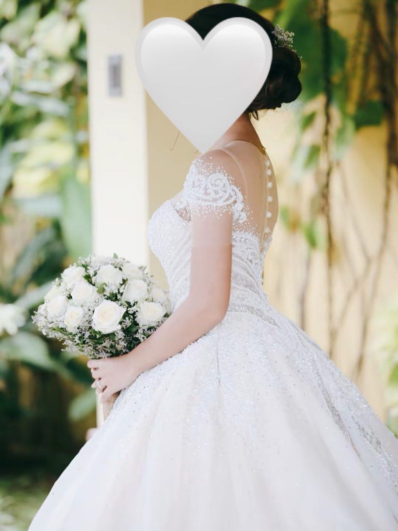 WEDDING GOWN (Category: Evening dresses & gowns) located in Agdangan. Submitted by alexmalenaleclerc (Listing ID 1457858069, Image 3). Description: wedding gown bought from abbhie bridal🤍 customized gown originally bought for ₱25k - size xs - fits 24-25 waist - 4'11" height for reference - used once - NEEDS DRY CLEANING (nasa photos makikita marumi yung laylayan) - customized champagne color lining hindi siya white na white para makita yung bead