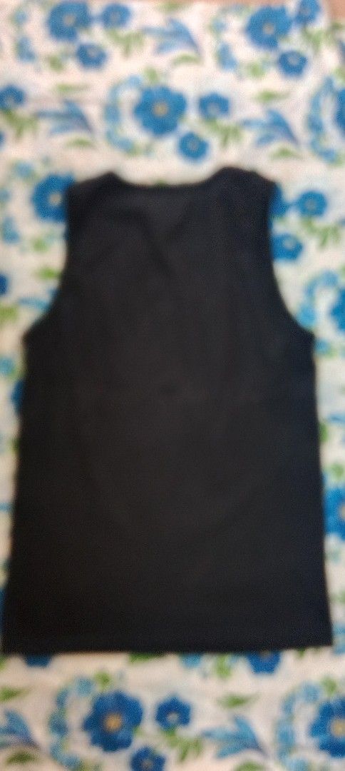 XLARGE Black Graphic Tank Top Size S (Category: Tshirts & Polo Shirts ) located in Koronadal. Submitted by gifts.thrifts (Listing ID 1457719352, Image 2). Description: - XLARGE black tank top - Features a vibrant graphic print on the front with colorful bokeh lights and the XLARGE logo - Made of 100% soft cotton - Designed, printed, and embellished in the USA - T-shirt manufactured in Haiti - Includes a small XLARGE tag on the bottom hem.