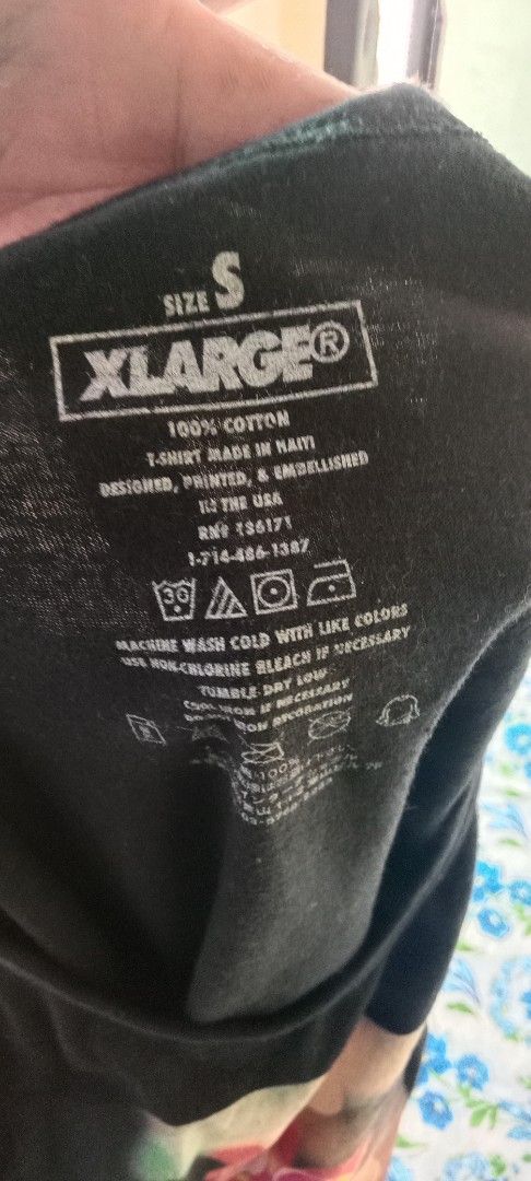 XLARGE Black Graphic Tank Top Size S (Category: Tshirts & Polo Shirts ) located in Koronadal. Submitted by gifts.thrifts (Listing ID 1457719352, Image 3). Description: - XLARGE black tank top - Features a vibrant graphic print on the front with colorful bokeh lights and the XLARGE logo - Made of 100% soft cotton - Designed, printed, and embellished in the USA - T-shirt manufactured in Haiti - Includes a small XLARGE tag on the bottom hem.