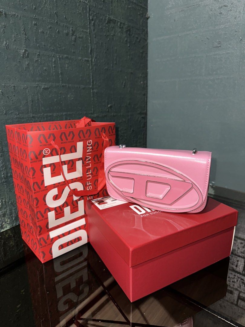 y2k DIESEL BAGUETTE BAG (Category: Shoulder Bags) located in Mandaluyong City. Submitted by wear_emout (Listing ID 1457878521, Image 1). Description: with detachable cross body cord complete inclusion -hang tag -paper bag -dust bag superb!!!.