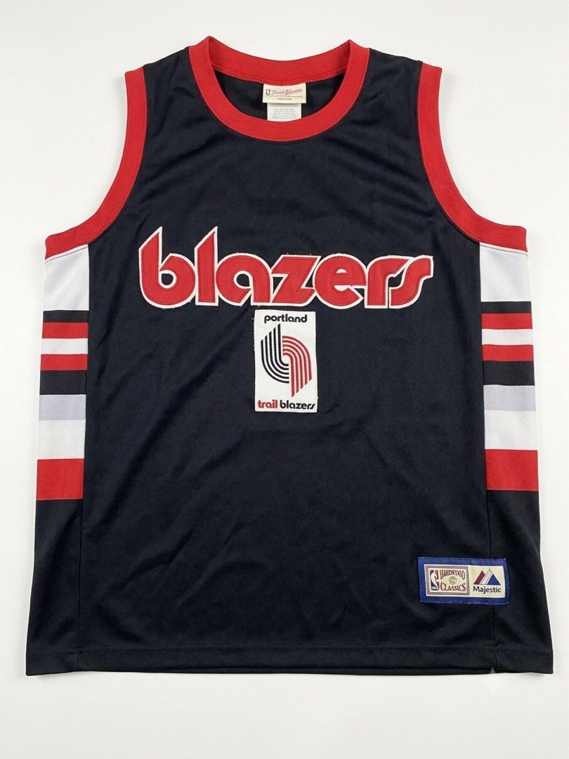 Y2K HIPHOP TRAILBLAZER JERSEY (Category: Activewear) located in Manila. Submitted by fuckfreeworld (Listing ID 1457833606, Image 1). Description: - Portland Trail Blazers Hardwood Classics Jersey - Brand: Majestic - Features classic 'Blazers' logo and team colors - Red, white, and grey striped side panels - Ideal for any Portland Trail Blazers fan.
