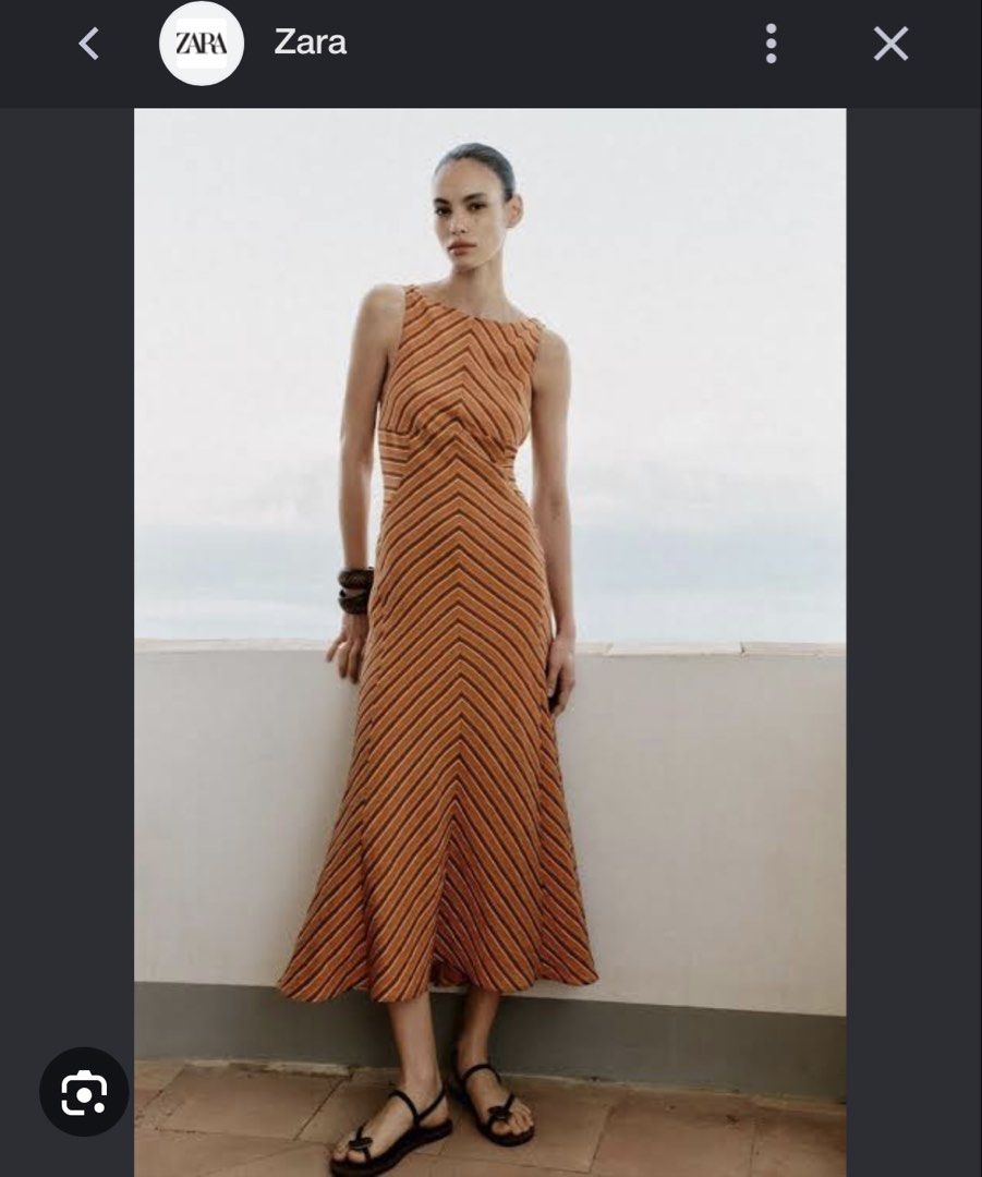 Zara Striped Midi Dress with Open Back (Category: Dresses) located in Makati City. Submitted by attybee (Listing ID 1457848734, Image 1). Description: - brand new Zara orange and brown striped midi dress - Sleeveless design - Flattering fit - Open back detail - Textured fabric - Ideal for summer occasions or casual outings.