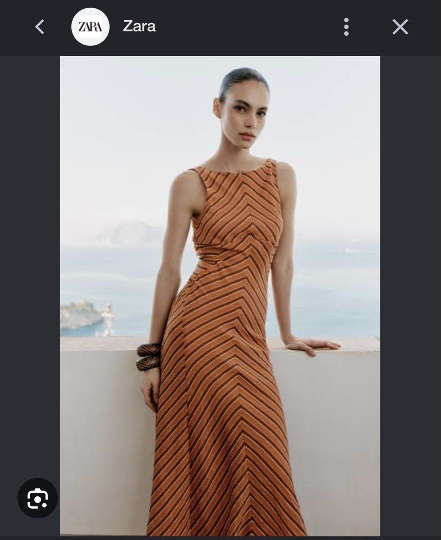 Zara Striped Midi Dress with Open Back (Category: Dresses) located in Makati City. Submitted by attybee (Listing ID 1457848734, Image 2). Description: - brand new Zara orange and brown striped midi dress - Sleeveless design - Flattering fit - Open back detail - Textured fabric - Ideal for summer occasions or casual outings.