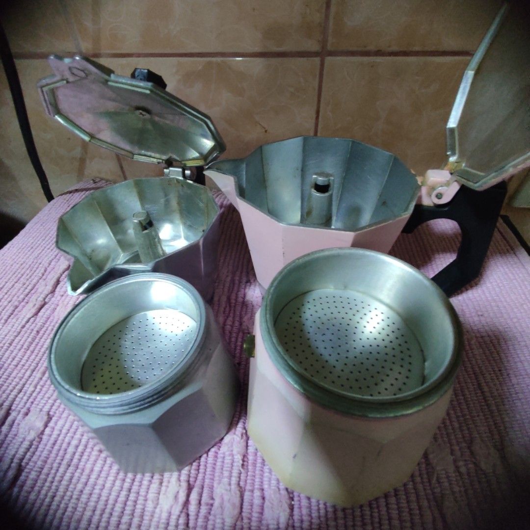 2 Moka Pot Coffee Makers - Silver and Pink (Category: Coffee Machines & Makers) located in Las Pinas. Submitted by lawki_stuff (Listing ID 1458090476, Image 3). Description: - Set of 2 Moka Pot Coffee Makers - Colors: Silver and Light Pink - Material: Aluminum - Perfect for brewing authentic espresso at home - Selling as a set.