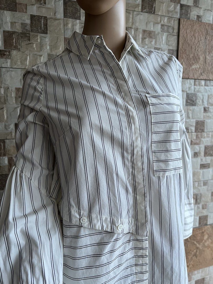 3.1 PHILLIPLIM - ABSTRACT DESIGN LONG SLEEVES (Category: Luxury Apparel) located in Bacolod City. Submitted by timelessbyjosh (Listing ID 1458004784, Image 2). Description: BEST FOR CASUAL & FORMAL OUTFITS SIZE : ACTUAL COLOR : BLACK & WHITE COLOR RATE : 10 OUT OF 10 CONDITION : NEAR NEW MATERIAL : 100 % COTTON MADE IN : CHINA FLAWS : NONE DIMENSIONS LENGTH - 26. 5 ( FRONT ) & 28 ( BACK ) WIDTH ( ARMPIT TO ARMPIT ) - 19 SLEEVE LENGTH ( ARMPIT TO 