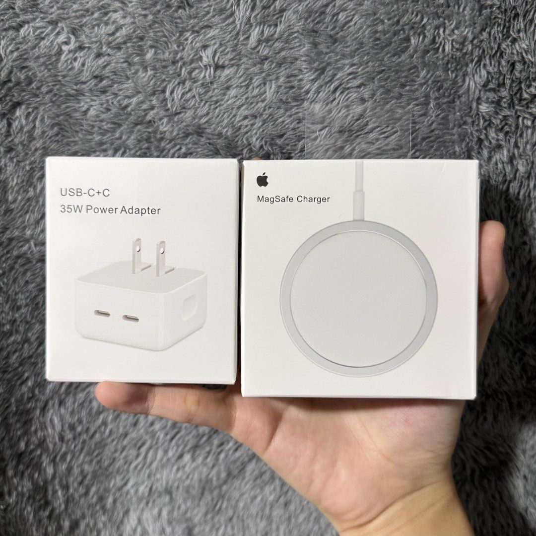 35W Apple Dual Type C Adapter + MagSafe Charger (Category: Chargers & Cables) located in Makati City. Submitted by alialiiiii (Listing ID 1458048007, Image 1). Description: Fast Charger ✅ 100% Working ✅ Tested ✅ Condition: New ✅ 📍Pick Up / Deliver Via Lalamove 🚚.