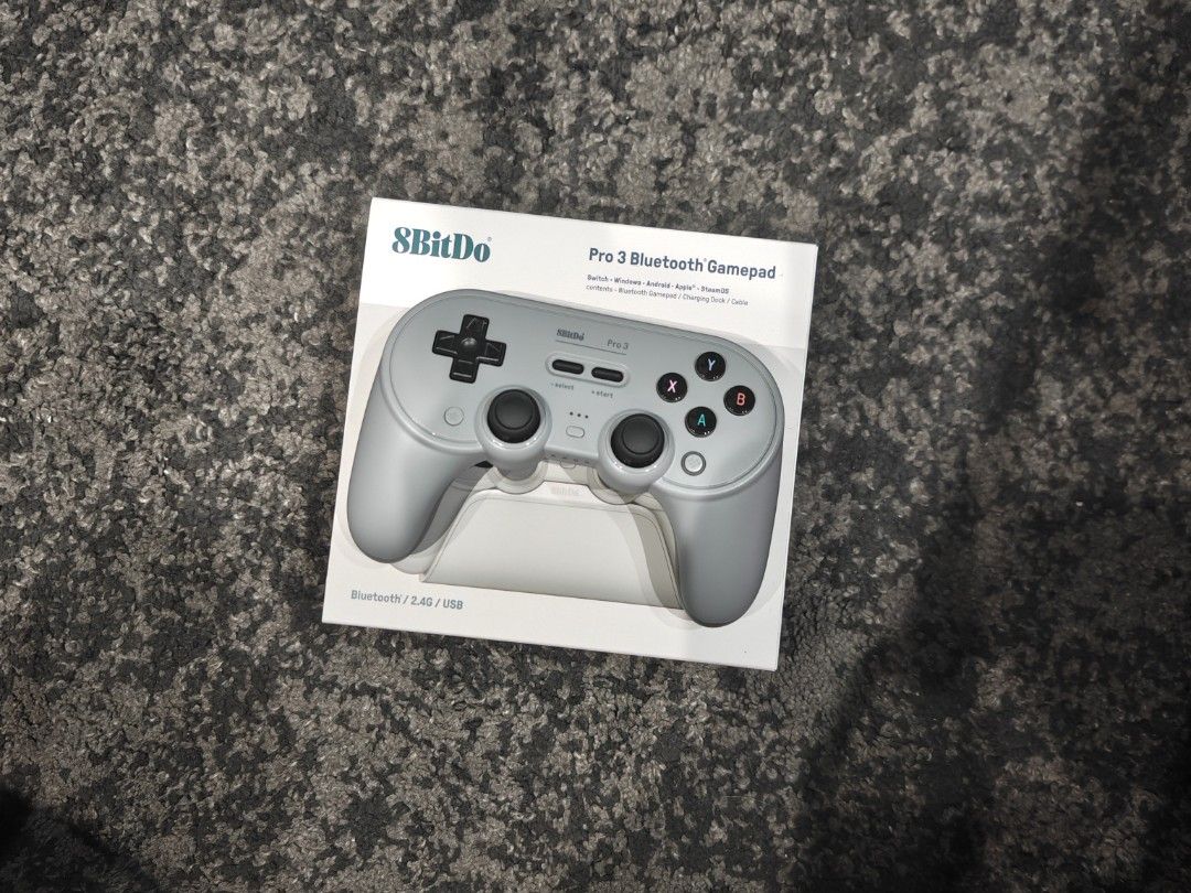 8bitdo Pro 3 Controller (Category: Controllers) located in Singapore. Submitted by cedriccjh (Listing ID 1457993505, Image 1). Description: 8bitdo Pro 3 controller includes - controller - dock - USB dongle - USB cable - swappable spare buttons - swappable joystick analog stick - original box .