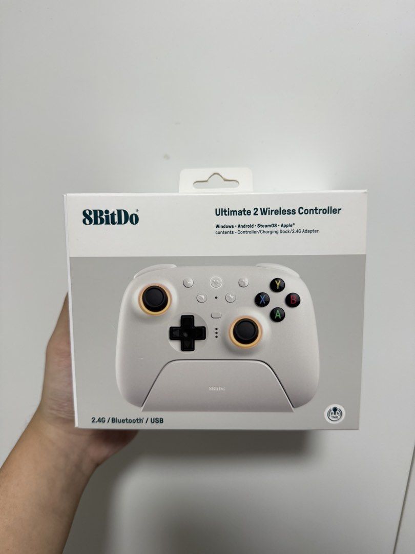 8BitDo Ultimate 2 Wireless Controller White (Category: Controllers) located in Singapore. Submitted by whattttthehellyy (Listing ID 1458076317, Image 1). Description: Selling an 8BitDo Ultimate 2 Wireless Controller. letting go at $50! price slightly negotiable Works with Windows, Android, SteamOS, and Apple devices. Connects via 2.4G, Bluetooth, or USB. Includes controller, charging dock, and 2.4G adapter..