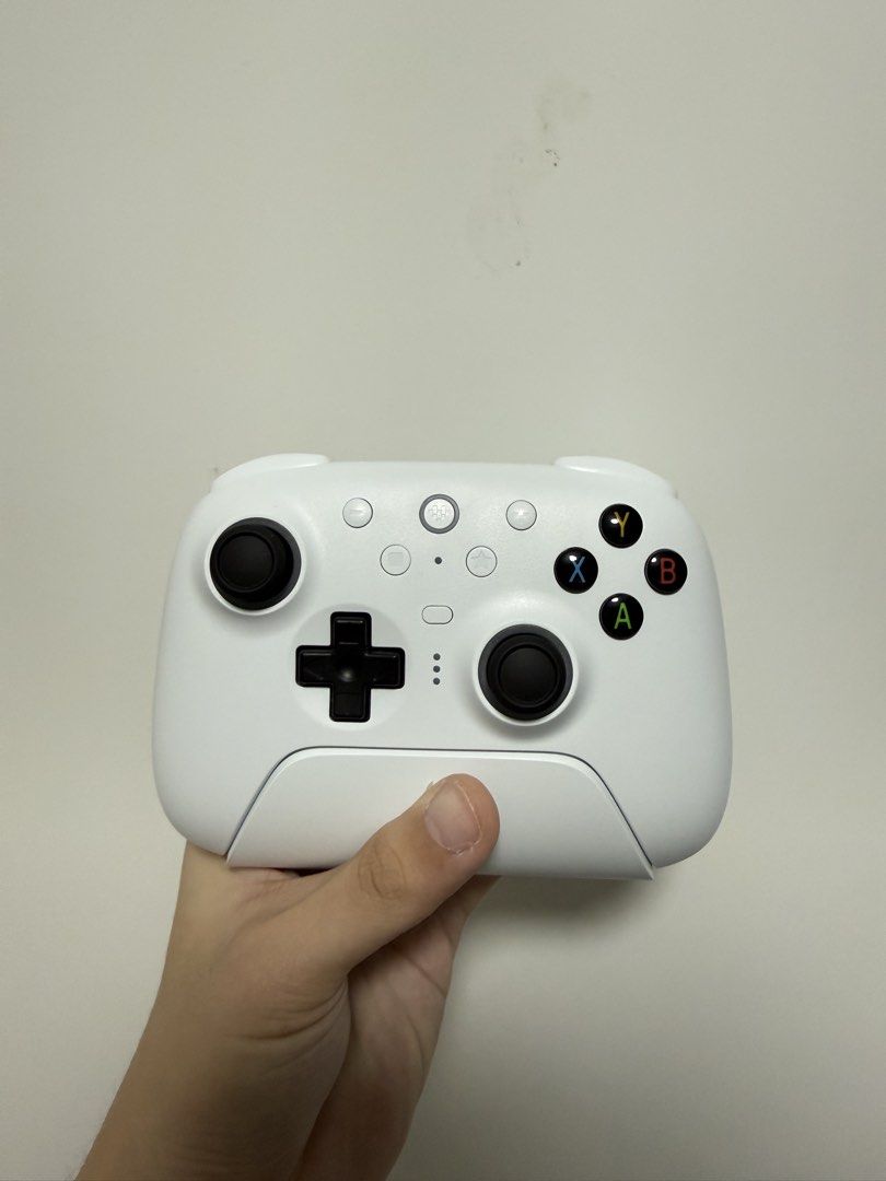 8BitDo Ultimate 2 Wireless Controller White (Category: Controllers) located in Singapore. Submitted by whattttthehellyy (Listing ID 1458076317, Image 2). Description: Selling an 8BitDo Ultimate 2 Wireless Controller. letting go at $50! price slightly negotiable Works with Windows, Android, SteamOS, and Apple devices. Connects via 2.4G, Bluetooth, or USB. Includes controller, charging dock, and 2.4G adapter..