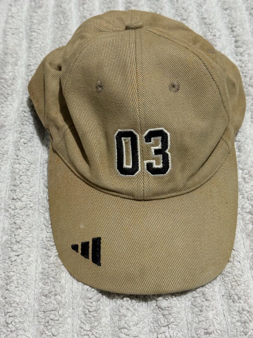 VINTAGE Adidas Cap/Baseball Cap (Category: Caps & Hats) located in Agdangan. Submitted by raven_ravenly123 (Listing ID 1458004242, Image 3). Description: * Headline: Vintage 2003 Adidas Promotional Curved Brim Cap — Khaki / Streetwear Accessory * Description: Add a touch of retro utility to your rotation with this classic khaki cap featuring embroidered “03” detailing and subtle branding accents. A great vintage-style find with a clean, versatile