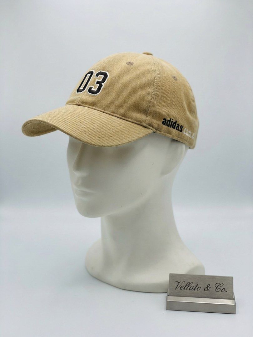 VINTAGE Adidas Cap/Baseball Cap (Category: Caps & Hats) located in Agdangan. Submitted by raven_ravenly123 (Listing ID 1458004242, Image 1). Description: * Headline: Vintage 2003 Adidas Promotional Curved Brim Cap — Khaki / Streetwear Accessory * Description: Add a touch of retro utility to your rotation with this classic khaki cap featuring embroidered “03” detailing and subtle branding accents. A great vintage-style find with a clean, versatile