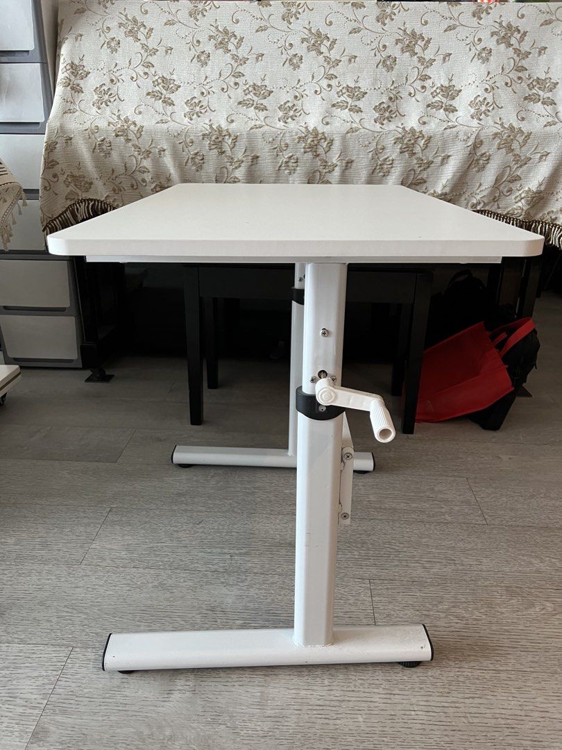 Adjustable Study Table (Category: Tables & Sets) located in Singapore. Submitted by houseofharry (Listing ID 1457941676, Image 2). Description: Height adjustable study table Table size is 80cm by 50cm.