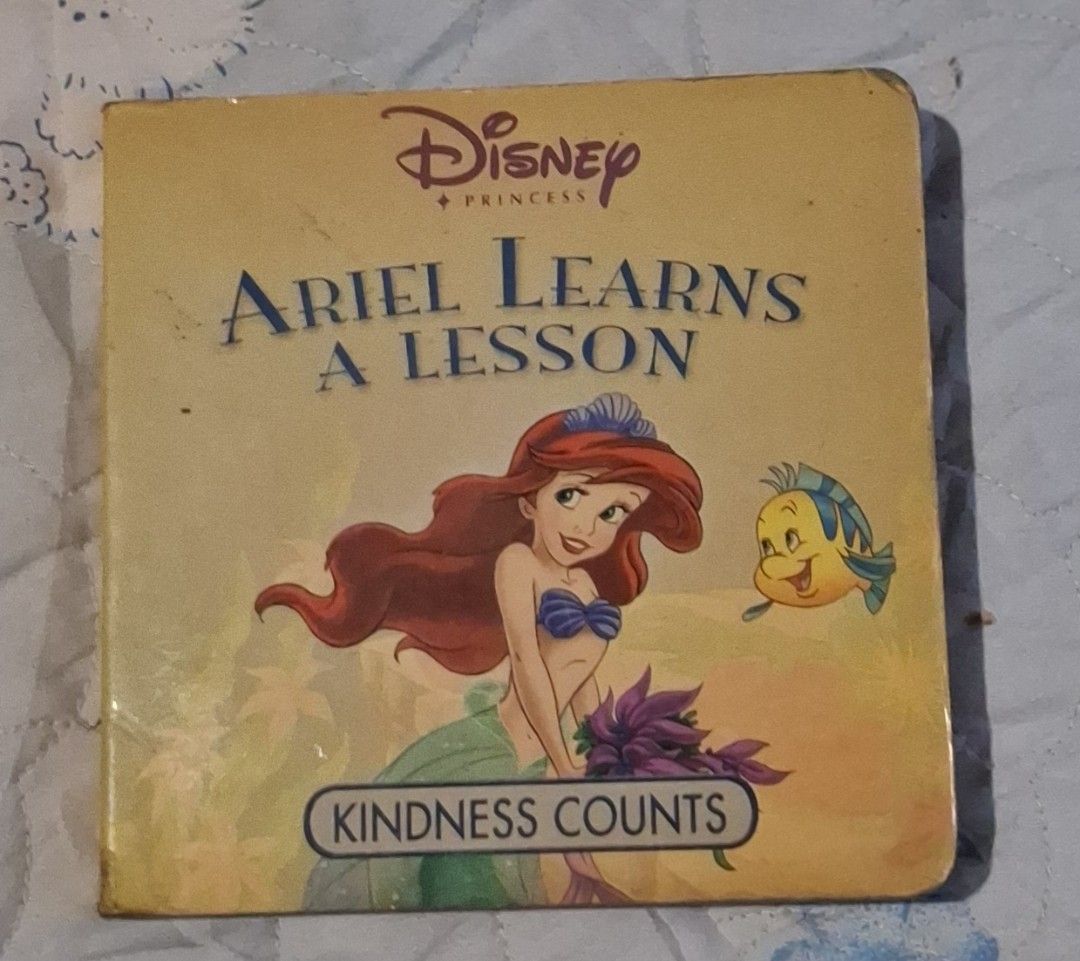 Ariel Learns a Lesson Mini Boardbook (Category: Children's Books) located in Caloocan City. Submitted by haydee88 (Listing ID 1457914299, Image 1). Description: 🍒Preloved Old book 🍒Has visible signs of aging/usage, storage, have tanning & light creases 🍒See photos for book condition 🍒Please manage your expectations.
