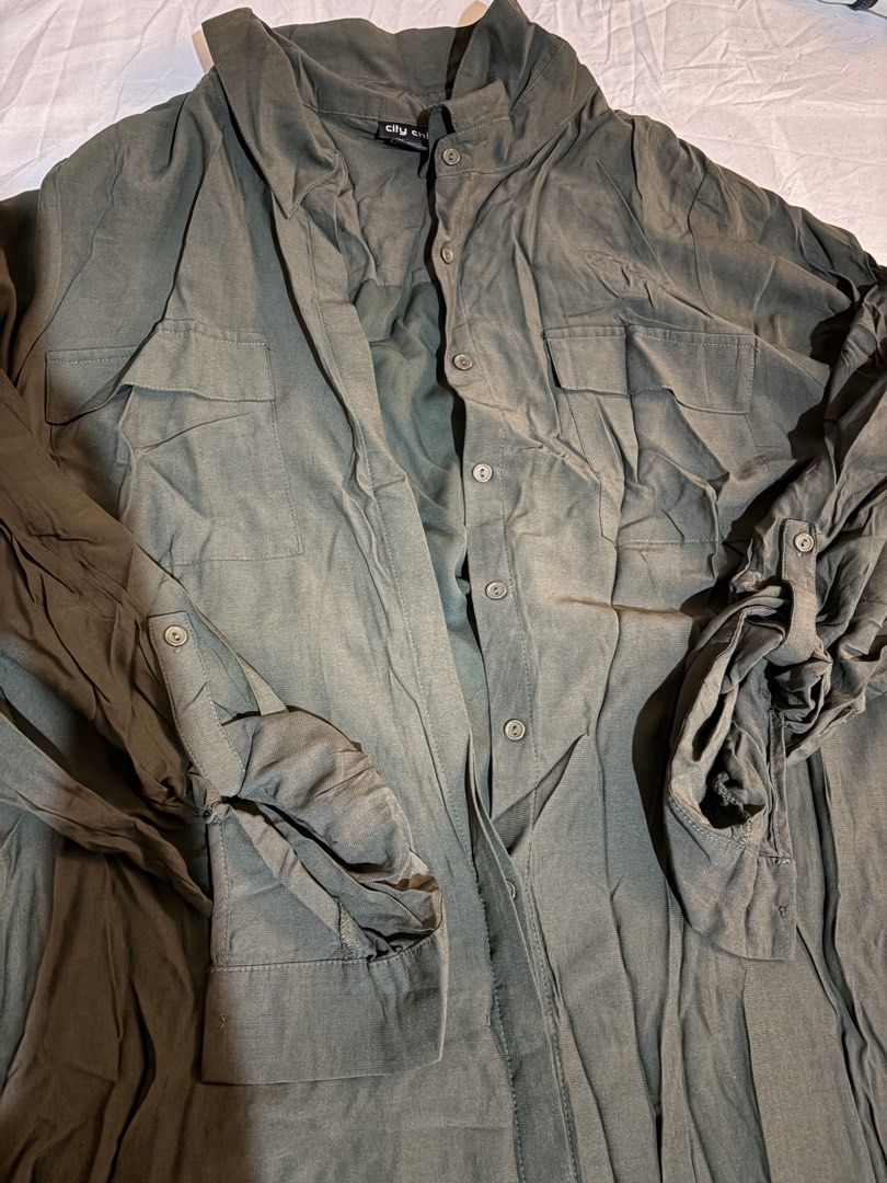 Army green dress (Category: Maternity wear) located in Leyte. Submitted by iamkat.b (Listing ID 1458056113, Image 2). Description: * Army green long dress * Long sleeves with collared neckline * Button-front closure * Lightweight fabric * Casual and easy to style * Condition: 9/10 * Gently used and well cared for * No noticeable flaws.