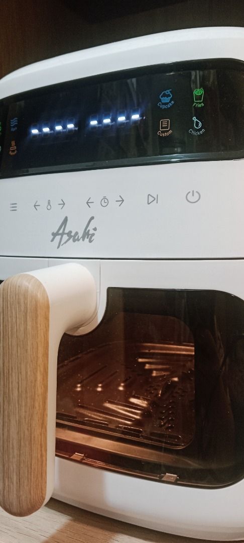 Asahi AF-800 Air Fryer a Premium Model (Category: Fryers) located in Santa Rosa. Submitted by southie777 (Listing ID 1458090765, Image 2). Description: USED ONCE ONLY (tried toast Bread) Original Price in Abenson around ₱4,800++ Reason for Selling: Hindi talaga ginagamit naka-display lang. The Asahi AF-800 Air Fryer is a premium model from the brand’s minimalist Wooden Series. It balances a large capacity for family-sized meals with precise digit