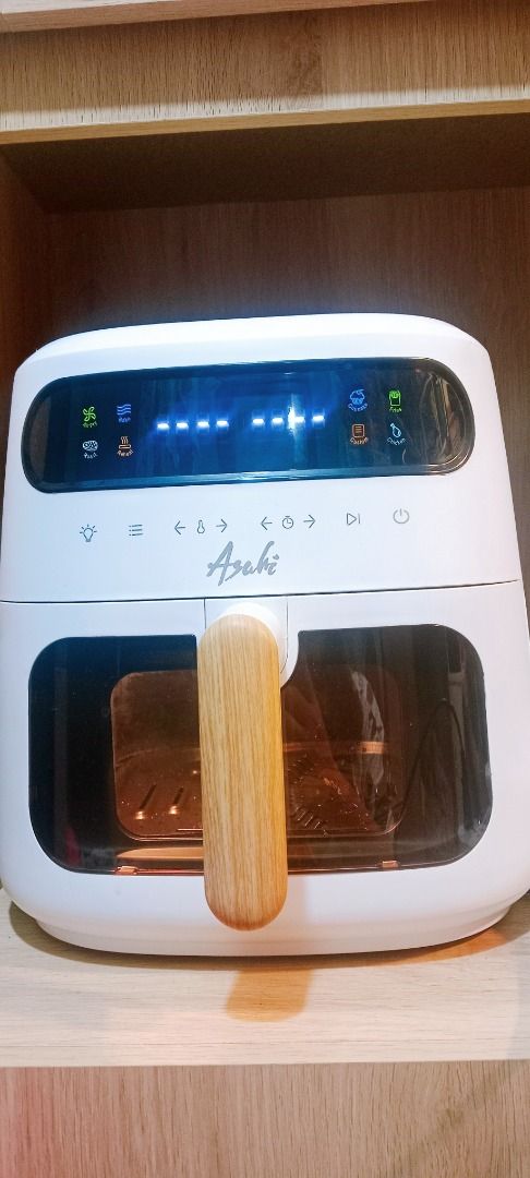Asahi AF-800 Air Fryer a Premium Model (Category: Fryers) located in Santa Rosa. Submitted by southie777 (Listing ID 1458090765, Image 3). Description: USED ONCE ONLY (tried toast Bread) Original Price in Abenson around ₱4,800++ Reason for Selling: Hindi talaga ginagamit naka-display lang. The Asahi AF-800 Air Fryer is a premium model from the brand’s minimalist Wooden Series. It balances a large capacity for family-sized meals with precise digit