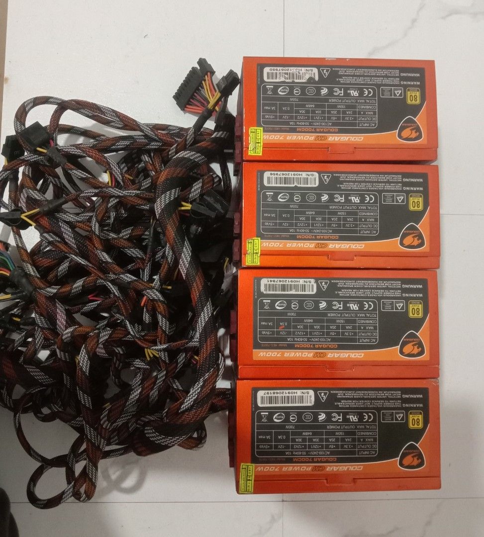 Assorted PC Power Supply Units - Cougar, Corsair, HEC (Category: Computer Parts) located in Bulacan. Submitted by romil0704961168 (Listing ID 1458026273, Image 1). Description: Selling a bundle of PC power supply units. Includes multiple Cougar 700W, Cougar RS 650W, Corsair VS650, Corsair CV550, and one HEC ACE 480PB. All units come with their respective cables. Great for builds or replacements. Please check photos for specific models and details