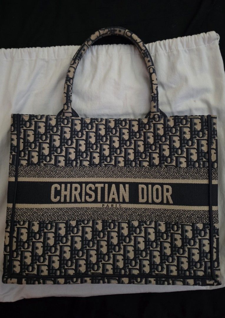 Authentic Christian Dior Book Tote Bag (Category: Luxury Bags & Wallets) located in Makati City. Submitted by declutterx2017 (Listing ID 1457960636, Image 1). Description: - Authentic Classic Dior Book Tote - Iconic Dior Oblique canvas - Spacious interior with central compartment - Comfortable top handles - Includes original dust bag - Ideal for everyday use or travel - Guaranteed authentic or get your money back Negotiable RFS: Extra bag/declutt