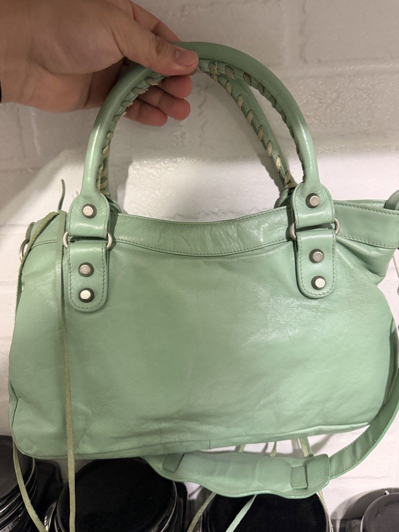 Balenciaga City - Mint Green Leather (Category: Luxury Bags & Wallets) located in Taguig. Submitted by luxeria_ (Listing ID 1458031331, Image 2). Description: - Balenciaga Part Time bag - mint green color -Lampo zipped -coded -with metal plate -negotiable.