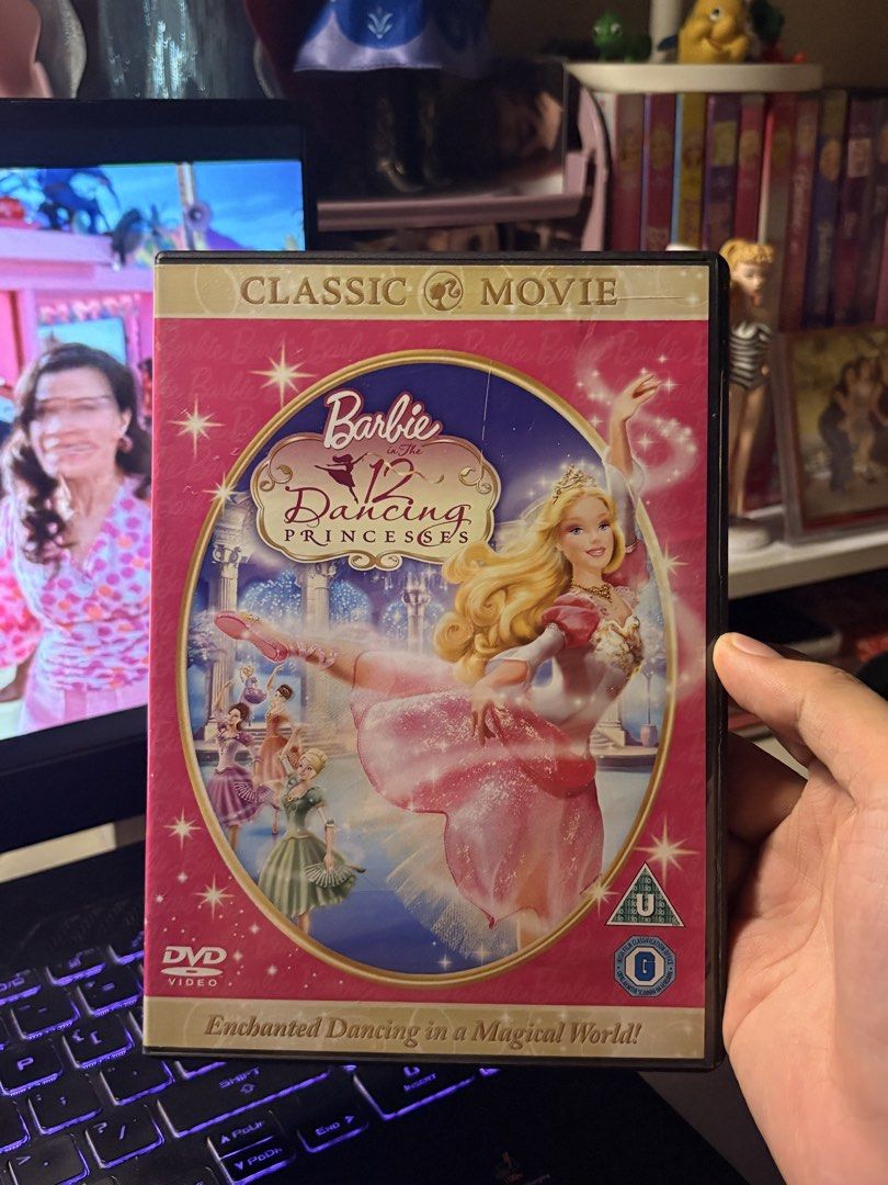 Barbie in The 12 Dancing Princesses DVD (Category: CDs & DVDs) located in Manila. Submitted by erikaspreloveditems (Listing ID 1458008302, Image 1). Description: - Classic Barbie Movie: The 12 Dancing Princesses - Format: DVD Video - Cover Tagline: 'Enchanted Dancing in a Magical World!' - Ideal for: Any Barbie fan - Perfect for: Adding to your collection of animated films.