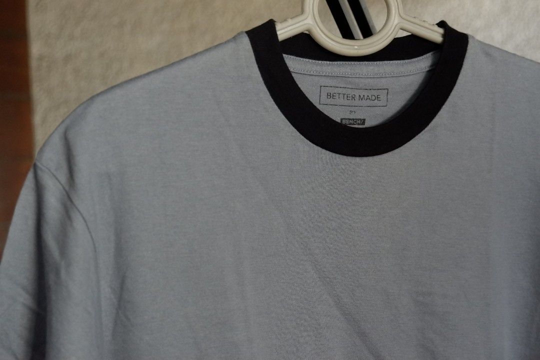 Better Made by Bench Grey Ringer T-shirt (Category: Tshirts & Polo Shirts ) located in Manila. Submitted by fiercehorse_29cebd (Listing ID 1457959064, Image 2). Description: - Grey ringer tee from Better Made by Bench - Made from recycled PET bottles - Features a small stain on the front (please check photos) - Perfect for casual everyday wear.