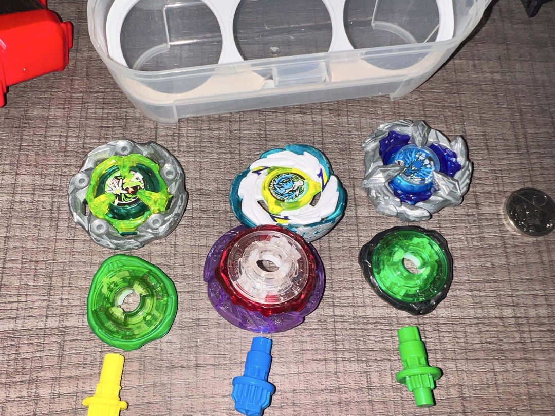 Beyblade X 3G Deck (Tourna-Ready) (Category: Action & Battle Toys) located in Las Pinas. Submitted by hunnieroll (Listing ID 1458022929, Image 2). Description: *helping my brother sell his collection! Blades: Green WiRo HB (7.5-8/10) Pegasus Blast (7/10) PWing (8-9/10) Ratchets (7-8/10) 1-60 Green 3-60 Green 9-60 Red Bits Blue Hexa Yellow Low Orb Green Rush Yellow Winder Launcher (medyo tabingi ripcord) *can meetup las piñas or alabang para ma-ch