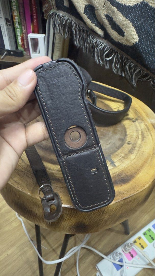 Black Leather Camera Case and Strap (Category: Camera Bags & Carriers) located in Rizal. Submitted by nate0523 (Listing ID 1457953225, Image 3). Description: rfs: - will not use anymore i want to change style - some scratches pero part of its style - for FujiFilm x100F Case.