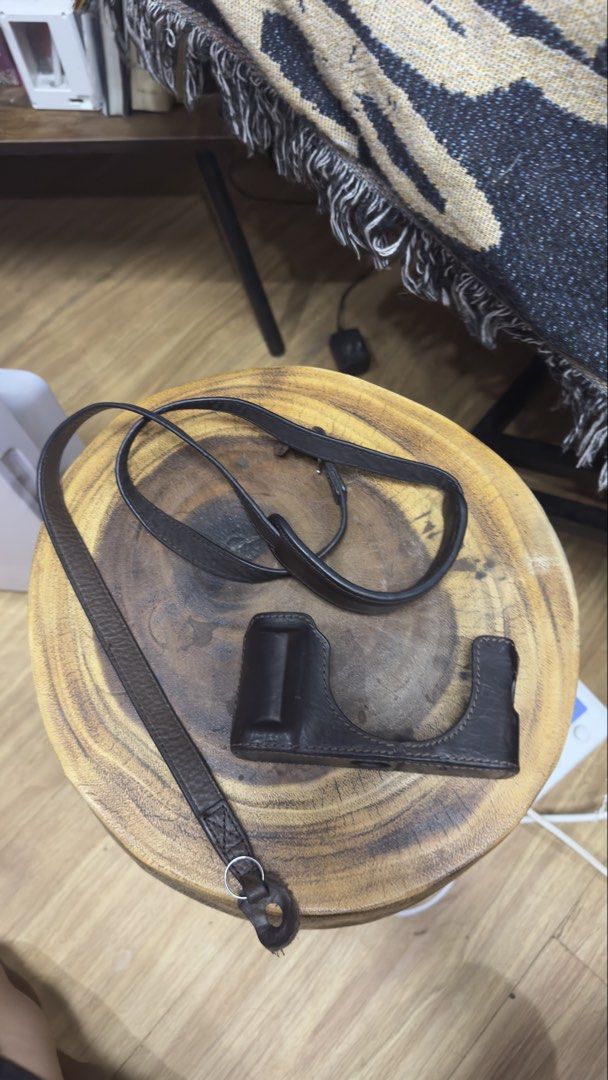 Black Leather Camera Case and Strap (Category: Camera Bags & Carriers) located in Rizal. Submitted by nate0523 (Listing ID 1457953225, Image 1). Description: rfs: - will not use anymore i want to change style - some scratches pero part of its style - for FujiFilm x100F Case.