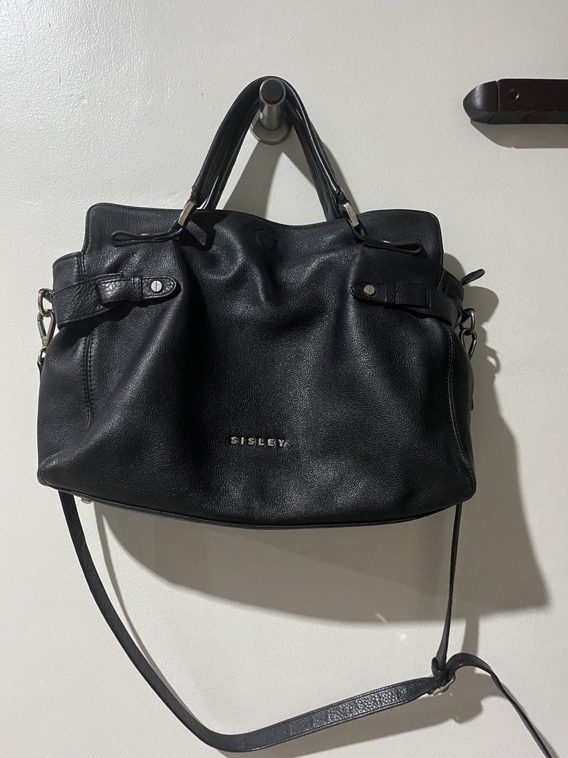 Black Leather Sisley Bag (Category: Shoulder Bags) located in Cebu City. Submitted by mendycloset (Listing ID 1439734728, Image 1). Description: Black Leather Sisley (Original and functional) Sling or handbag Fits 14 inch laptop (I usually use it as carrier of my 12 inch ipad or laptop) Moving out - need to declutter asap Location is Cebu City .