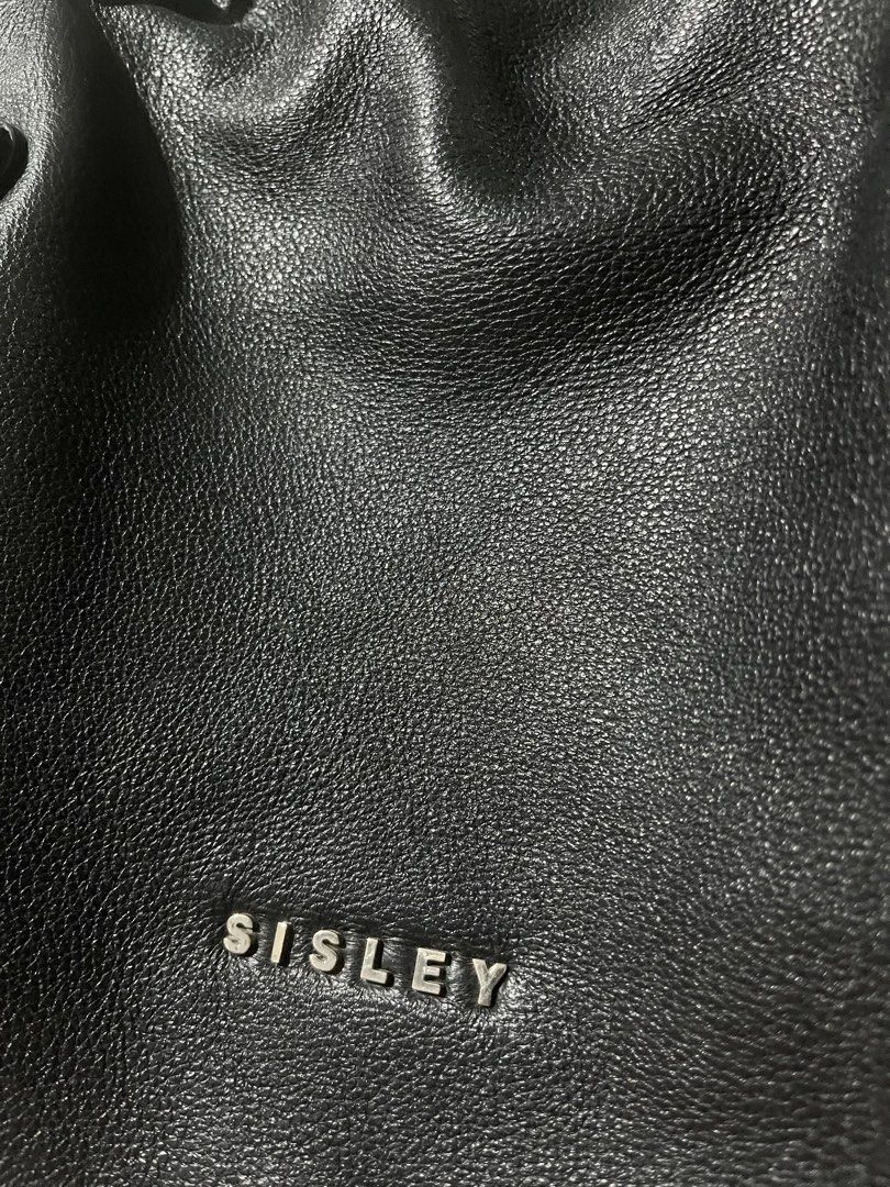 Black Leather Sisley Bag (Category: Shoulder Bags) located in Cebu City. Submitted by mendycloset (Listing ID 1439734728, Image 3). Description: Black Leather Sisley (Original and functional) Sling or handbag Fits 14 inch laptop (I usually use it as carrier of my 12 inch ipad or laptop) Moving out - need to declutter asap Location is Cebu City .