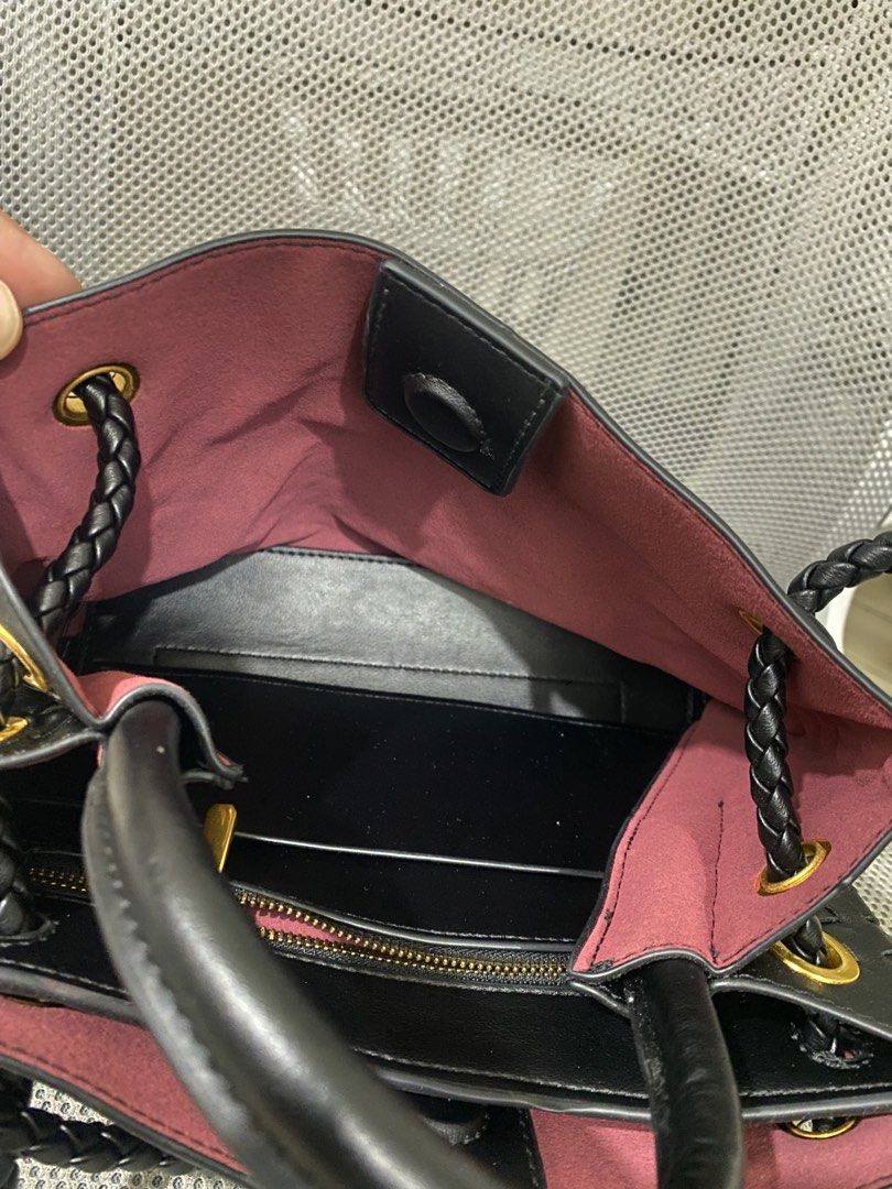 Black Woven Leather Handbag with Gold Hardware (Category: Shoulder Bags) located in Bacoor. Submitted by hallumae (Listing ID 1457995402, Image 3). Description: Metal clasp for closure With zipper pocket inside for important belongings Strap can be adjusted Can fit two phones, powerbank, wallet, alcohol, etc Width- 25.5cm Height-18.5cm .