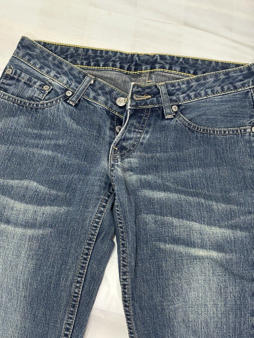 Blue Flare Jeans (Category: Jeans) located in Mandaluyong City. Submitted by missshopaholicabroad (Listing ID 1457995581, Image 2). Description: - Classic blue flare jeans - Mid-rise fit - Button and zip closure - Distressed wash for a vintage look - Comfortable denim material - Perfect for casual outfits.