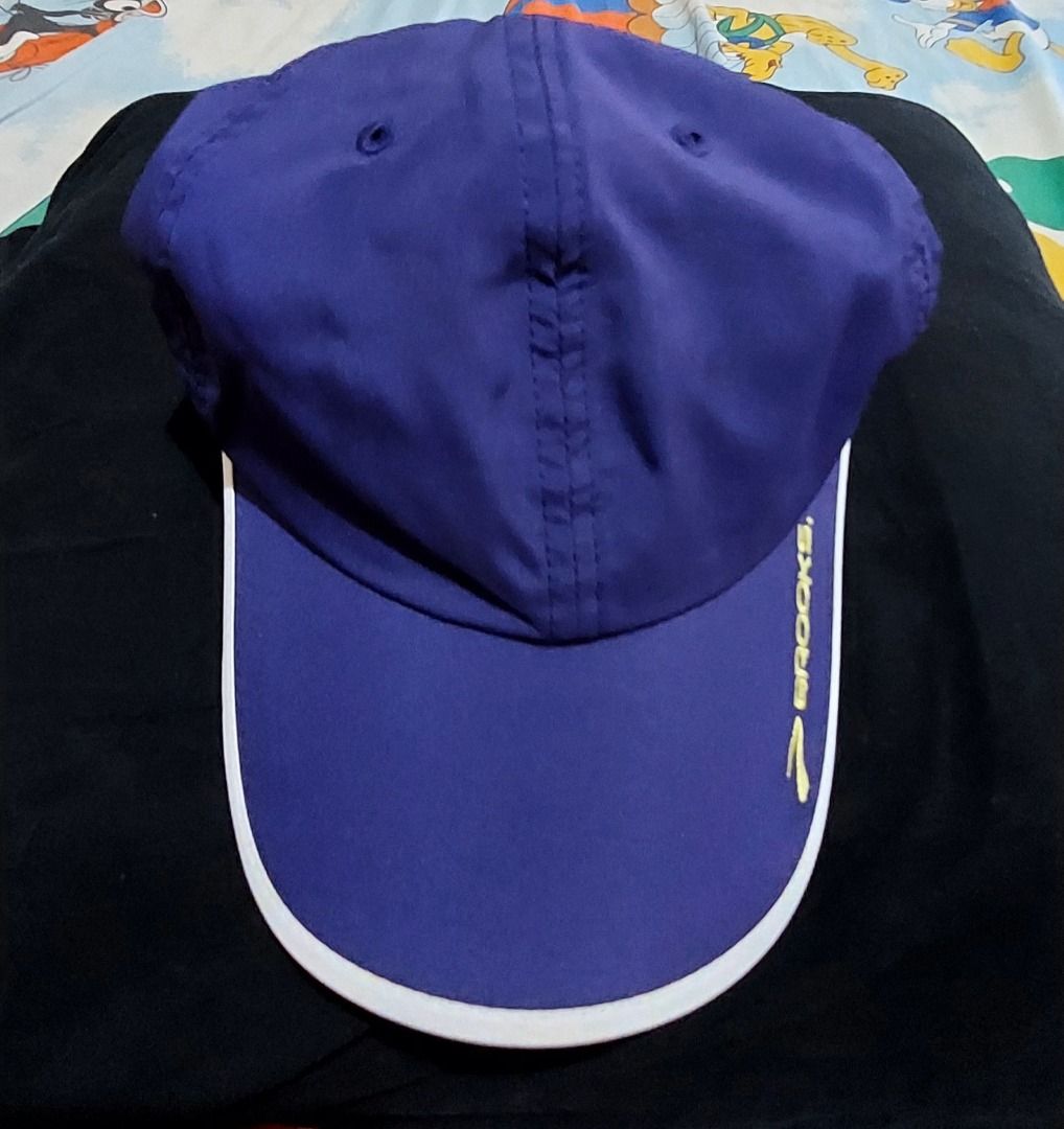 Brooks Purple Running Cap (Category: Caps & Hats) located in Legazpi City. Submitted by street_uniform (Listing ID 1457942107, Image 1). Description: -Purple Brooks running cap - Embroidered Brooks logo on the side - Note: Some intentionaldamage on the back, as pictured - Ideal for running or casual use.