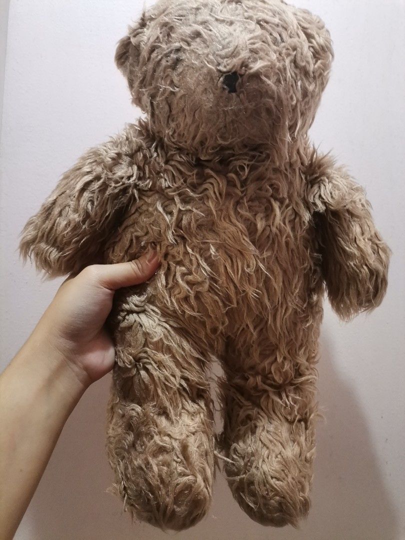Brown Shaggy Teddy Bear Plush Toy (Category: Plushies & Soft Toys) located in Makati City. Submitted by kookybearsstuff (Listing ID 1457968435, Image 1). Description: - Adorable brown teddy bear - Features shaggy, textured fur - Ideal for cuddling or as a decorative piece - Comfortable size for holding - Looking for a new loving home - From SG.