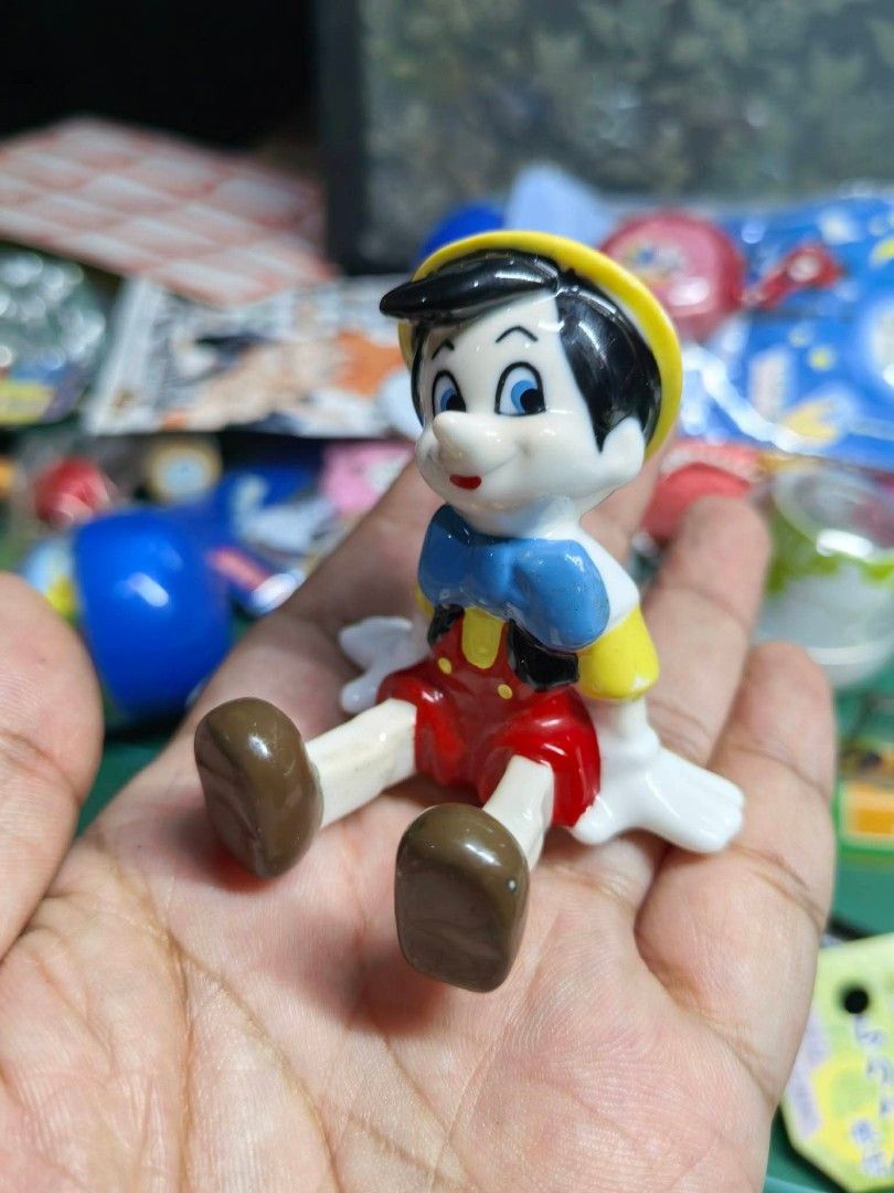 Bullyland Disney Pinocchio Figurine (Category: Figurines & Statues) located in Cebu City. Submitted by dudes_villanueva (Listing ID 1457952352, Image 3). Description: Bullyland Disney Pinocchio Figurine Material: Porcelain 📌 Featuring the classic character with a bright yellow hat, blue bow tie, and hand-painted details. 📌 Brand / Maker: Bullyland (German collectible manufacturer) 📌 Character: Pinocchio from the classic Walt Disney animated fi
