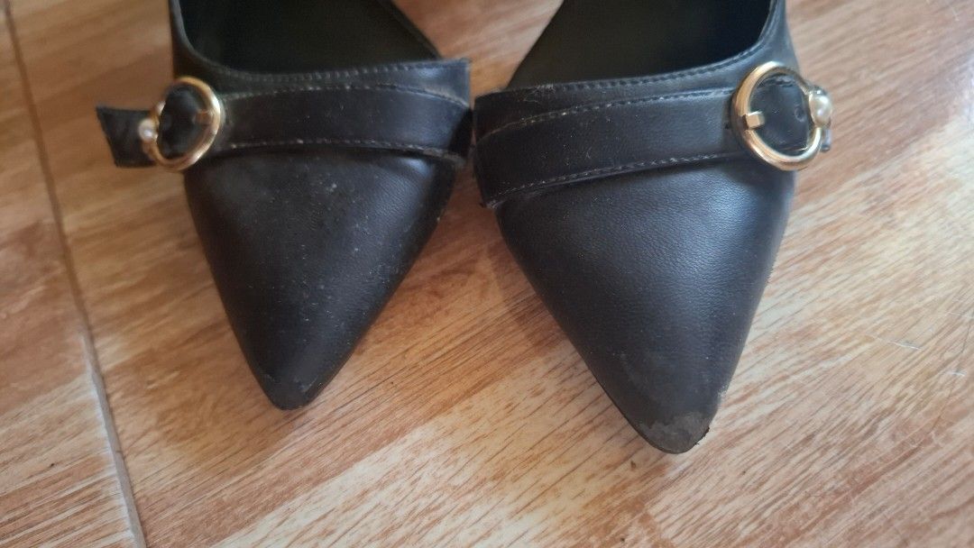 Charles & Keith Black Slingback Heels (Category: Heels) located in Tuguegarao City. Submitted by mondreigon (Listing ID 1457927392, Image 3). Description: size 37 pre loved Chic black slingback heels from Charles & Keith. Features a pointed toe, gold buckle with pearl accent, and adjustable slingback strap. Shows some wear on soles and heels..