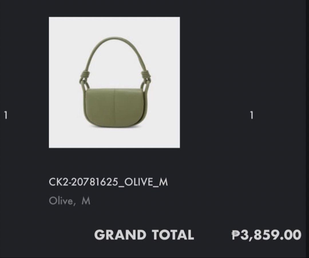 Charles & Keith Olive Green Knot Handle Shoulder Bag (Category: Shoulder Bags) located in Bacoor. Submitted by sofaritsalright (Listing ID 1457973462, Image 3). Description: - Bought for 3859 - Olive green shoulder bag from Charles & Keith. - Features a stylish knotted handle. - Includes a detachable strap for versatility. - Chic curved shape with subtle front stitching. - Brand name embossed on the front. - Ideal for everyday wear and tear..