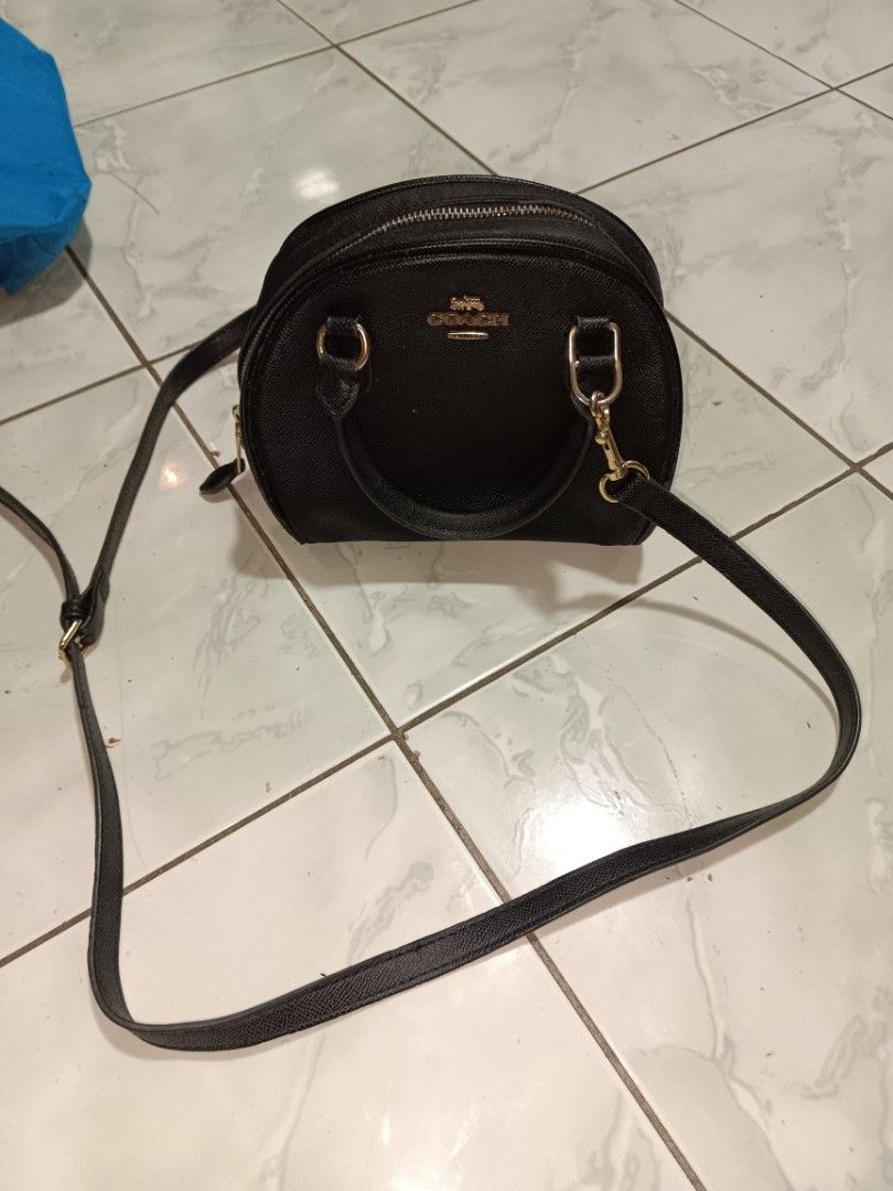 Coach Black Leather Mini Dome Satchel two way Bag (Category: Luxury Bags & Wallets) located in Manila. Submitted by caaths_collection (Listing ID 1458075040, Image 1). Description: - Black Coach Mini Dome Satchel - Versatile: Wear as a crossbody or carry by the top handles - Elegant gold hardware details - Secure zipper closure - Clean and spacious interior - Ideal for everyday use - preloved - AS IS.