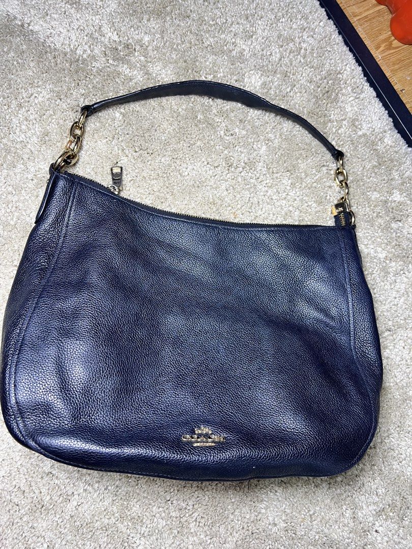 Coach Pebbled Leather Shoulder Bag (Category: Luxury Bags & Wallets) located in Mabalacat. Submitted by roseique2600 (Listing ID 1457939535, Image 1). Description: - Navy blue pebbled leather Coach shoulder bag - Gold hardware details - Secure zipper closure - Spacious interior, ideal for daily essentials - Great everyday bag.