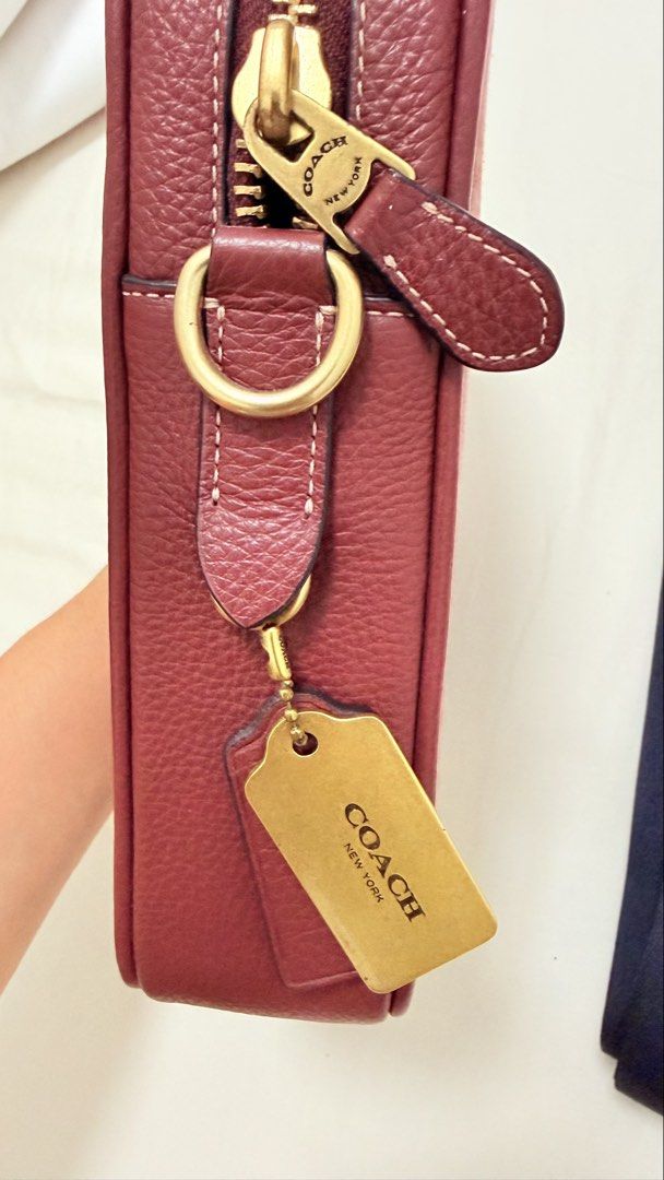 Coach Sullivan Crossbody in Chambray (Category: Sling Bags) located in Manila. Submitted by earlperezzzz (Listing ID 1457919522, Image 3). Description: Measurements: Length: 6.25" Height: 8.25" Width: 2.0" Materials: Signature chambray and refined pebble leather Fabric lining Strap: Detachable strap with 24" drop for shoulder or crossbody wear Features: Outside open pocket Inside multifunction pockets Zip closure Fits all phone sizes up to an iPh