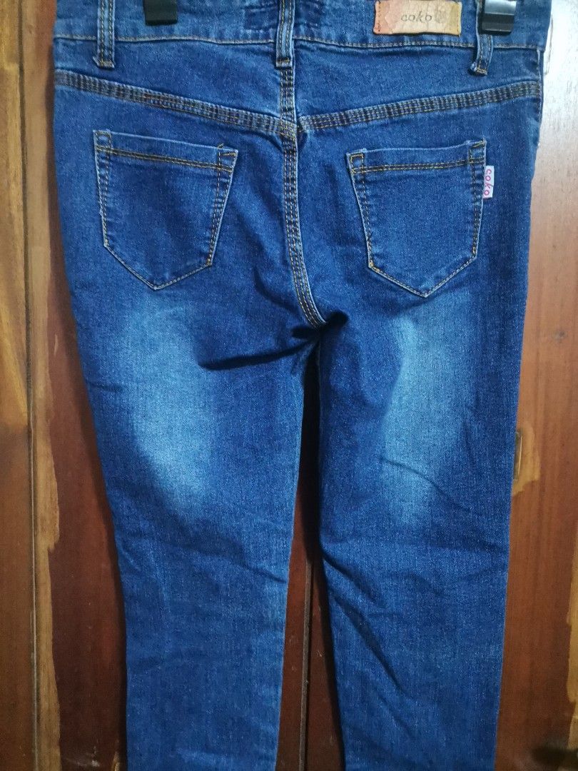 Coko Fashion Jeans Dip Dye (Category: Jeans) located in Makati City. Submitted by kookybearsstuff (Listing ID 1458017749, Image 2). Description: - Blue denim jeans - White dip-dye effect at the bottom hem - Patch detail on the front pocket - Button and zip fly closure - Two functional back pockets - 150 each.