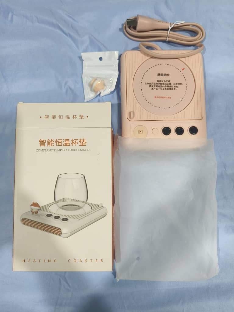 Constant Temperature Coaster (Category: Cookware & Accessories) located in Singapore. Submitted by solong123 (Listing ID 1458096721, Image 2). Description: How to use it? Place the cup on the coaster. The coaster maintains its temperature by heating its bottom, for example: ☕ Coffee 🍵 Tea 🥛 Warm Milk 🍫 Hot Chocolate.